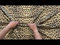Tejido de raso elástico con estampado animal