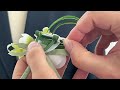Broche con flor perfumada
